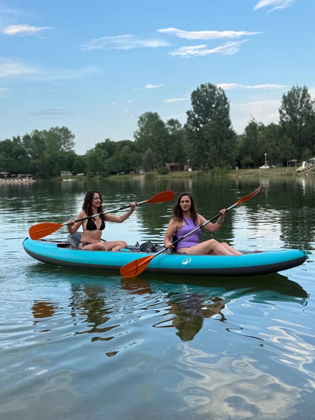 The water sports side of the episode — kayaks on the lake. Kayaking on the lake in Bela Crkva