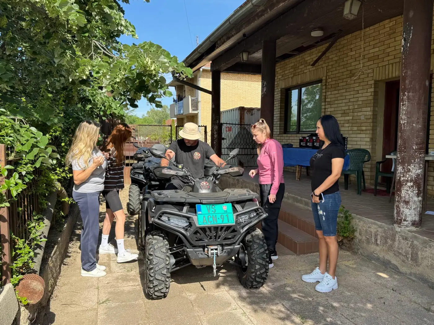 A Mad Max guide briefing riders at the quad bike before a guided tour in Bela Crkva